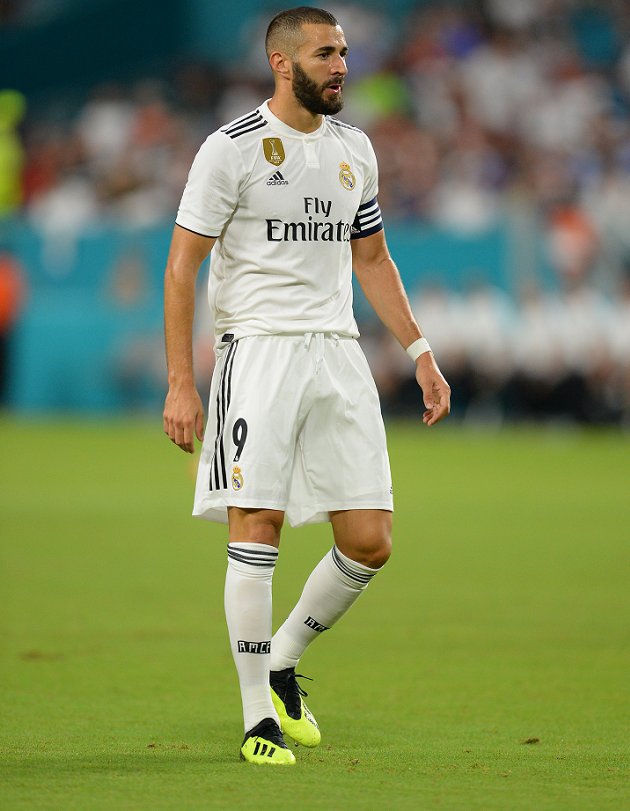 Real Madrid striker Benzema happy playing for Solari