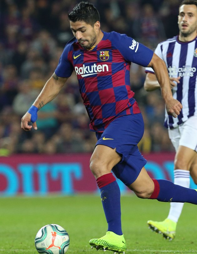Barcelona striker Luis Suarez writes off late title push